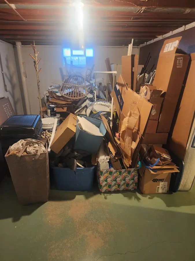 Roll-off dumpster container at job site for 2 Yard Dumpster Rental in Talladega